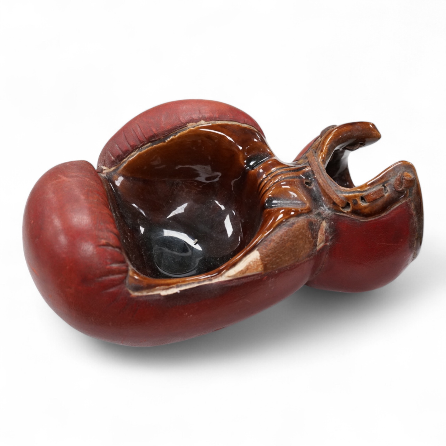 A Longchamp leather boxing glove trinket dish, c.1950s, 23cm wide